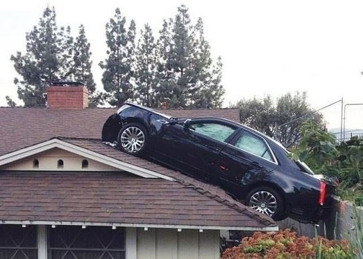 car-ontop-of-house-roof