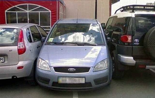 car-between-two-cars-too-close